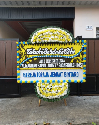 Papan Bunga Duka di Widasari